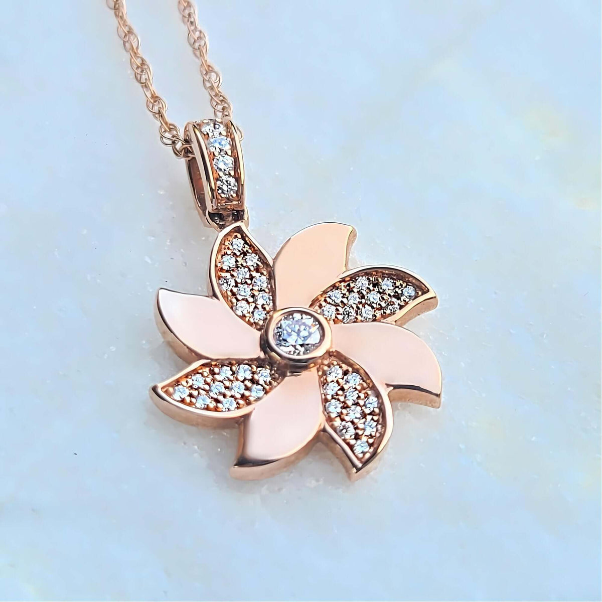 Sincerely Ginger Jewelry 14K Rose Gold Pinwheel Diamond Necklace