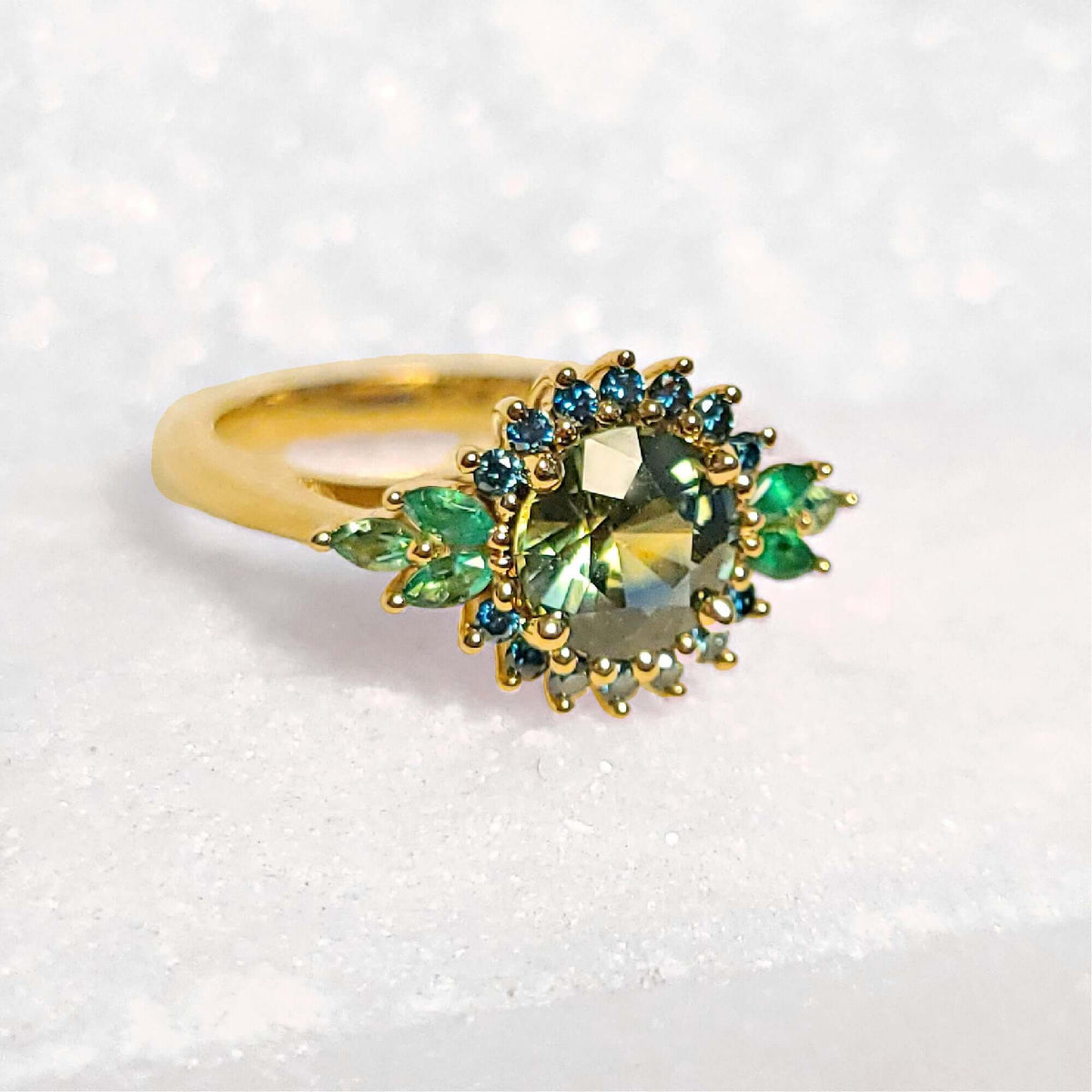 Sincerely Ginger Jewelry 14K Montana Sapphire Blue Diamond and Emerald Engagement and Cocktail Ring in Yellow Gold