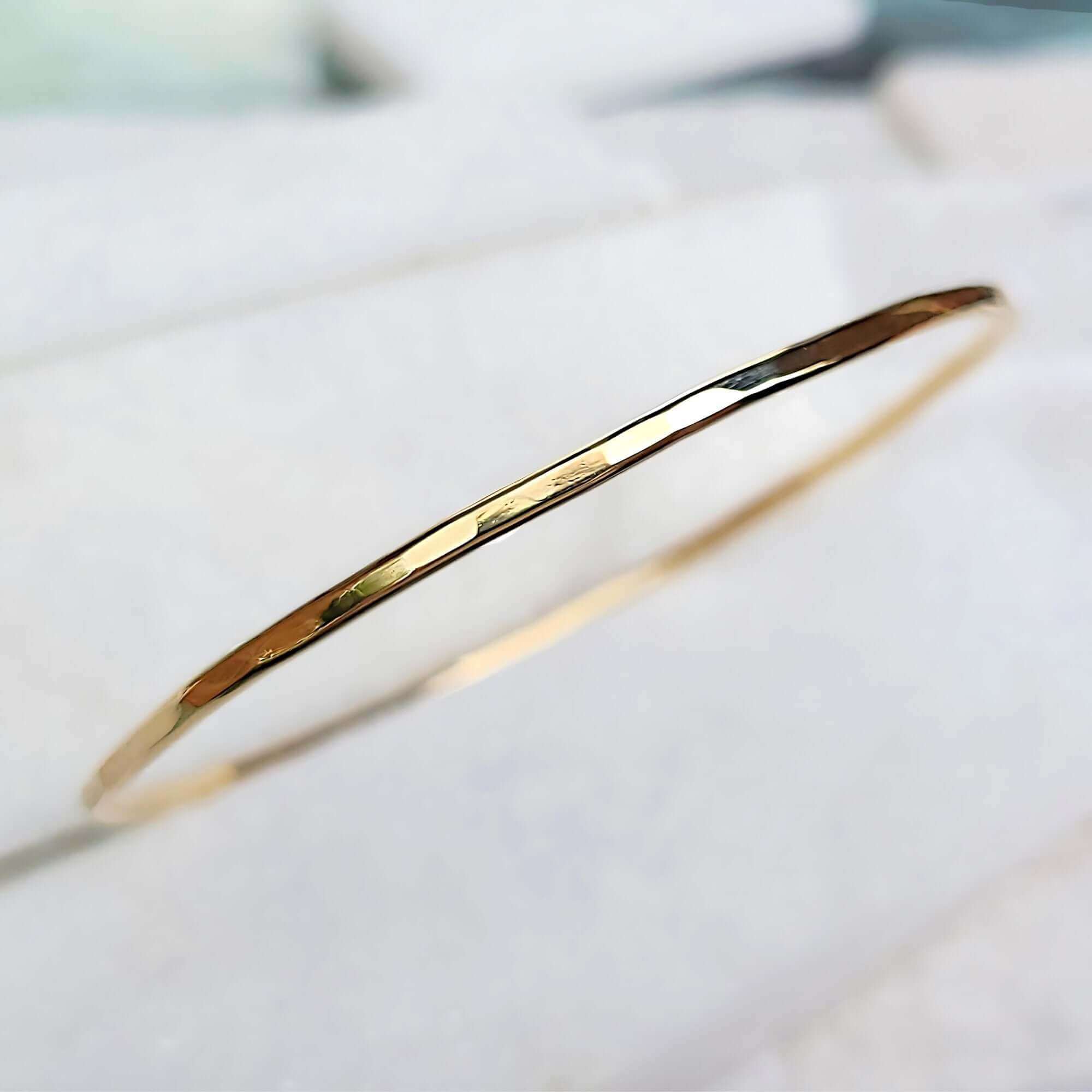 14K Lightly Hammered Bangle in Yellow Gold